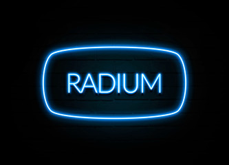 Radium  - colorful Neon Sign on brickwall