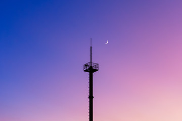 Silhouette telecommunications antenna for mobile phone with the moon