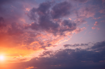 Naklejka na ściany i meble Dawn on a spring day and beautiful bright clouds.
