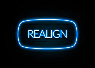 Realign  - colorful Neon Sign on brickwall