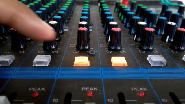 Footage without Sound : Hand - Controlling Audio Mixer