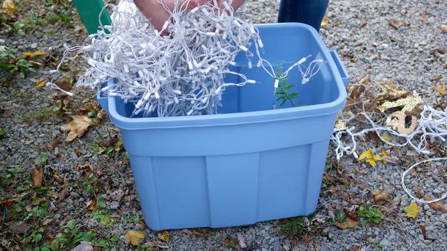 Unpacking angled icicle lights from Tote near Christmas time