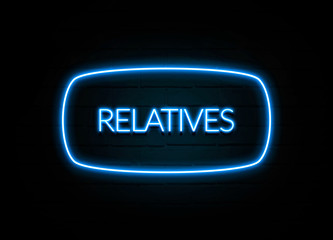 Relatives  - colorful Neon Sign on brickwall