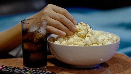sweet popcorn and cool beverage