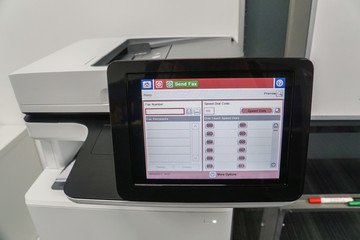 close up touch screen of office printer on fax page