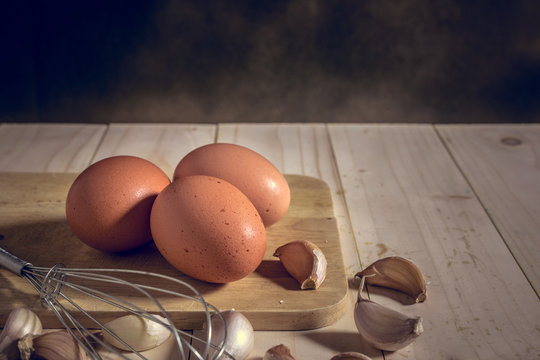 egg on wooden table, mystic photography and selective focus
