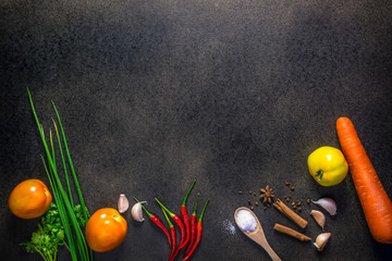 Fresh Vegetables for Healthy Diet on a rustic table. Top view, copy space, dark background