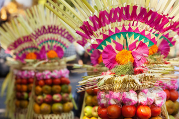 Traditional Balinese offering for gods, spirits of Bali island. Used at ceremonies on Galungan celebration, Melasti and silence day Nyepi. Holiday festivals, rituals, culture of Indonesian people.