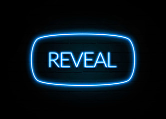 Reveal  - colorful Neon Sign on brickwall