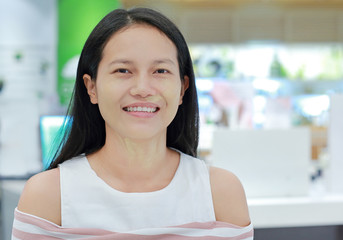 Portrait of asian woman with makeup. In the makeup process.