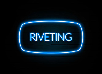 Riveting  - colorful Neon Sign on brickwall