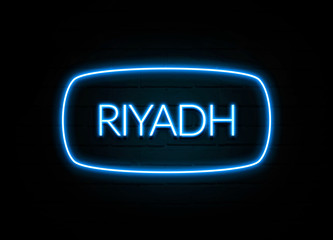 Riyadh  - colorful Neon Sign on brickwall