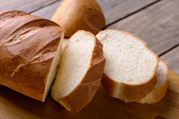 Closeup sliced bread on wooden table