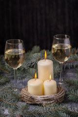 Candles and two glasses wine