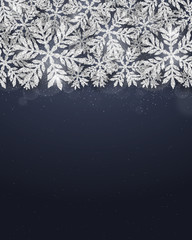 Merry Christmas and Happy New Year greeting card with silver glittering snowflakes frame on dark blue background