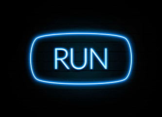 Run  - colorful Neon Sign on brickwall