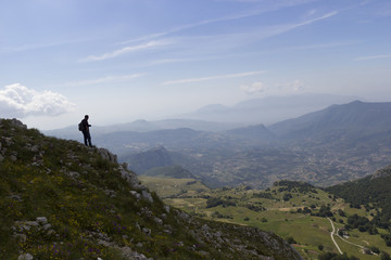 hiker on mountain trail
