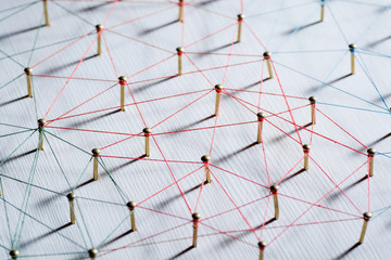 Linking entities. Network, networking, social media, connectivity, internet communication abstract. Web of thin thread on white background.