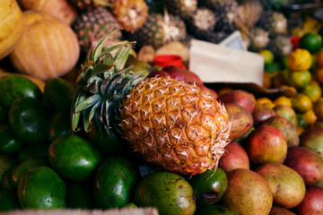 Pineapple close up on the market counter