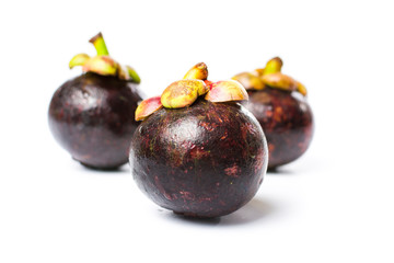 Purple mangosteen tropical fruit isolated on white