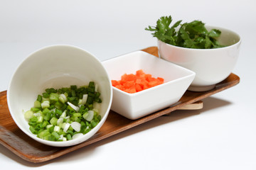 Carrot sliced Vegetable  in white cup on white background