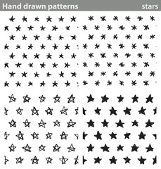 Naklejka premium Hand drawn patterns, stars. Four different seamless patterns made with hand drawn stars.