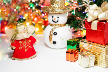gift box angel and snowman Christmas toy decoration. or New Year concept on light background