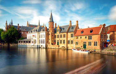 Fototapeta na wymiar Belgium - Historical centre of Bruges river view. Old Brugge buildings reflecting in water canal.
