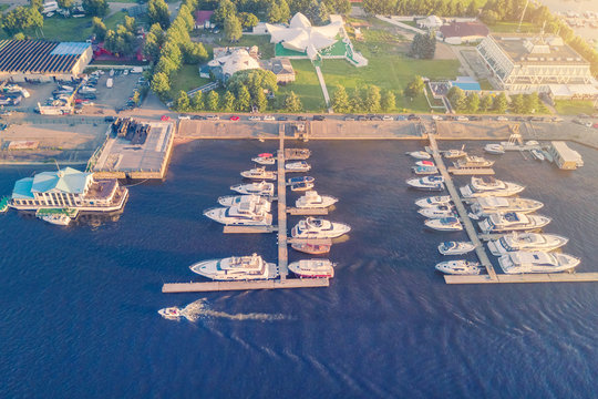 Top view of the berth for yachts in the sunlight