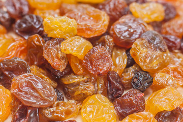 Dried raisins background close up