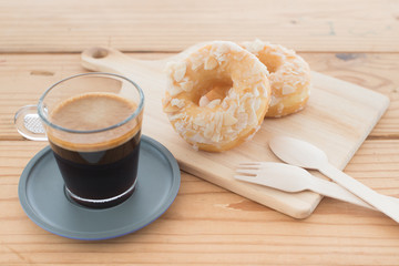 Cup of espresso and doughnut bakery.