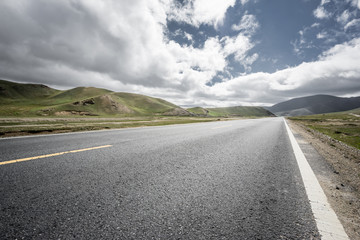 road through grassland in China