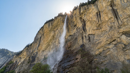 Fototapeta na wymiar Staubbach waterfall falling from cliff in Lauterbrunnen, Switzerland.