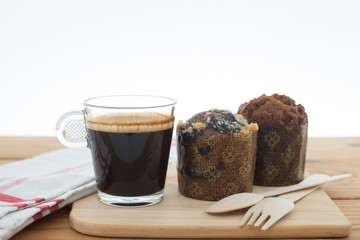 Cup of espresso and muffin bakery.