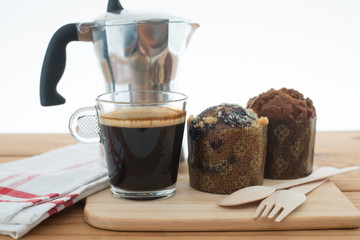 Cup of espresso and muffin bakery.