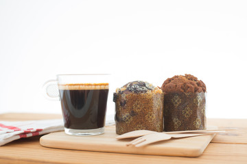 Cup of espresso and muffin bakery.