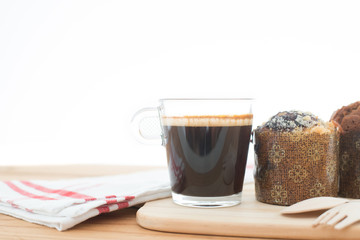 Cup of espresso and muffin bakery.