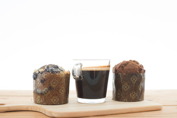 Cup of espresso and muffin bakery.
