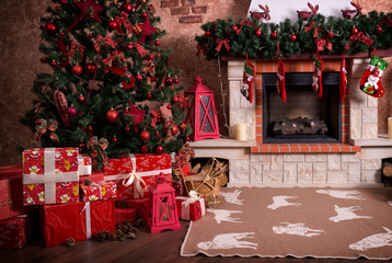 Many boxes with Christmas gifts under the Christmas tree