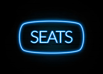 Seats  - colorful Neon Sign on brickwall