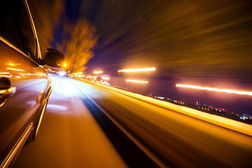 Car on the road with motion blur background.