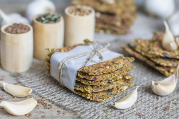 Healthy snack: cereal crunchy multigrain cereal flax seed pumpkin, coriander, sunflower seeds protein bread bar. Protein albumen source. Salted diet crispy crackers. Wholemeal.