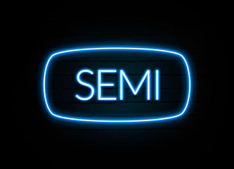 Semi  - colorful Neon Sign on brickwall