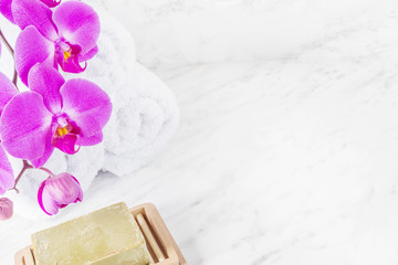 Soap, orchid and towels
