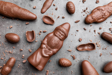 Delicious Christmas chocolate and sweets on rustic background