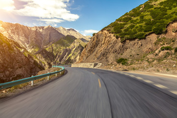 Fototapeta premium The road through the mountains