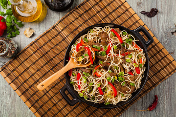 Chinese pasta with beef. Prepared in wok.