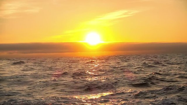 Picturesque view of sea waves at sunset, slow motion video 240 FPS  
