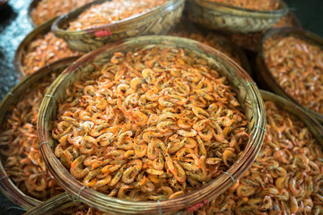Boiled little shrimp baskets. Seafood processing at fish market in Quy Nhon, south Vietnam