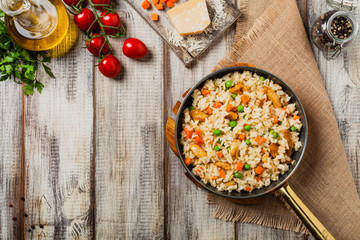 Delicious risotto with chicken and green peas.